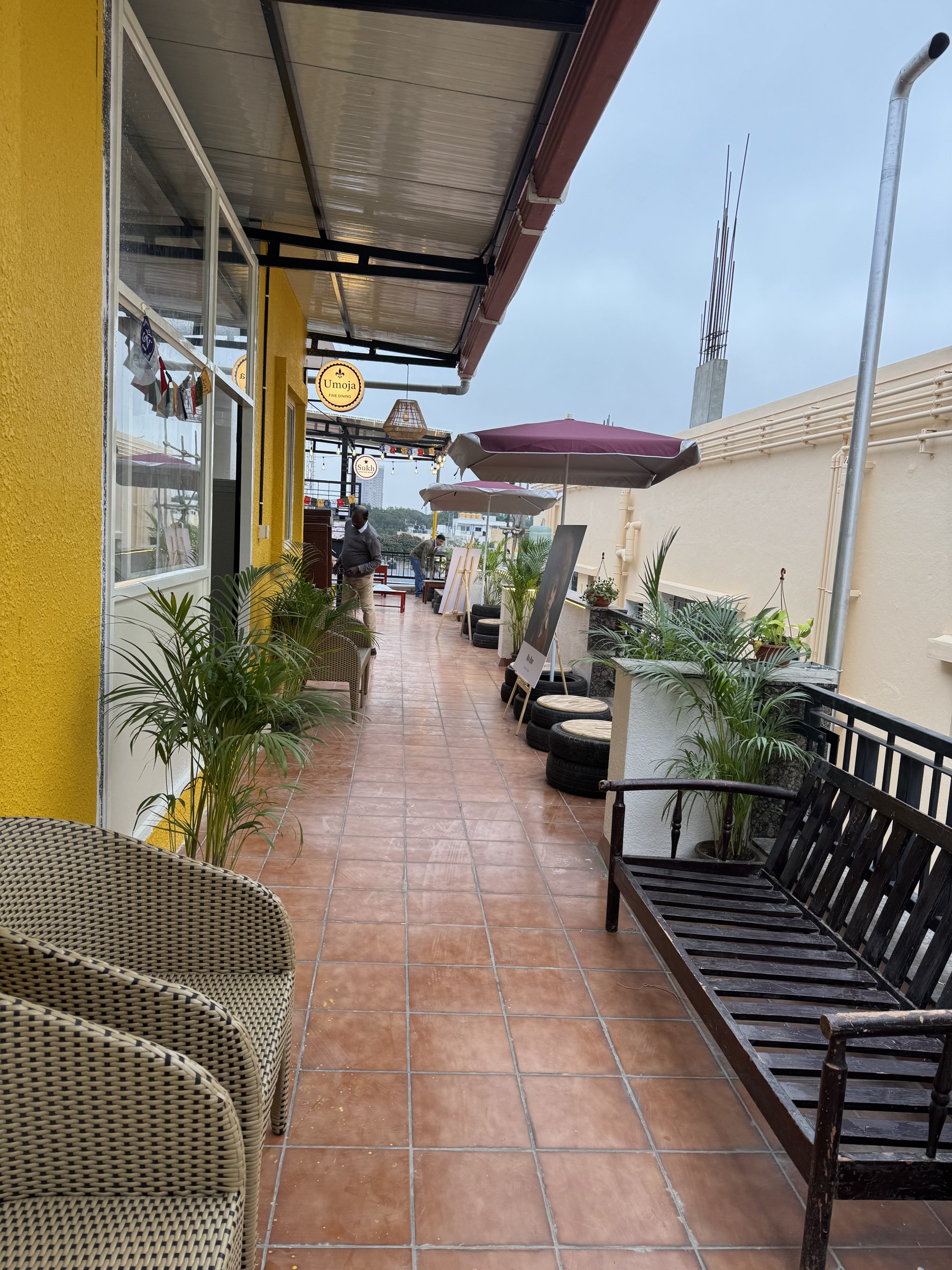 A Nia Studio rooftop terrace lounge with plants and modern seating